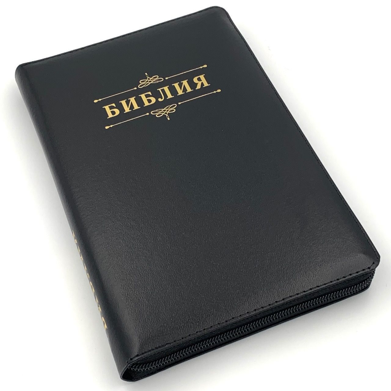 Библия 055zti код D3 дизайн "слово Библия", кожаный переплет на молнии с индексами, цвет черный, средний формат, 143*220 мм, параллельные места по центру страницы, белые страницы, золотой обрез
